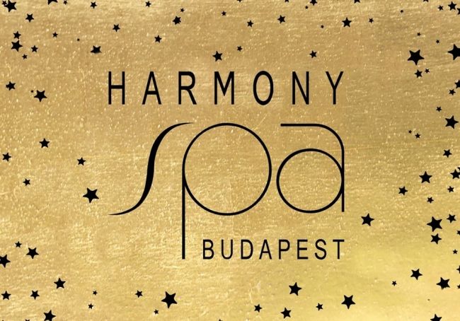 Couple relaxing poolside at Harmony Spa Budapest